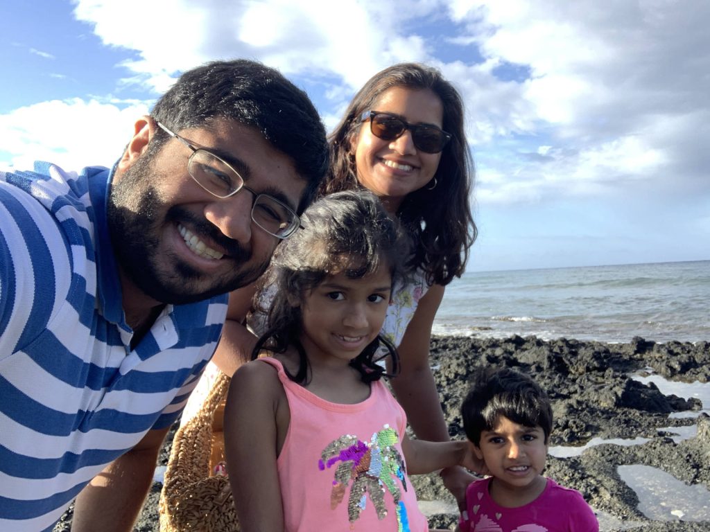 Family photo of Dr. Kulkarni, wife and children